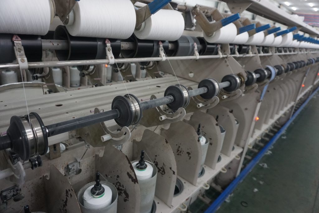 What is 100% Polyester Spun Yarn?